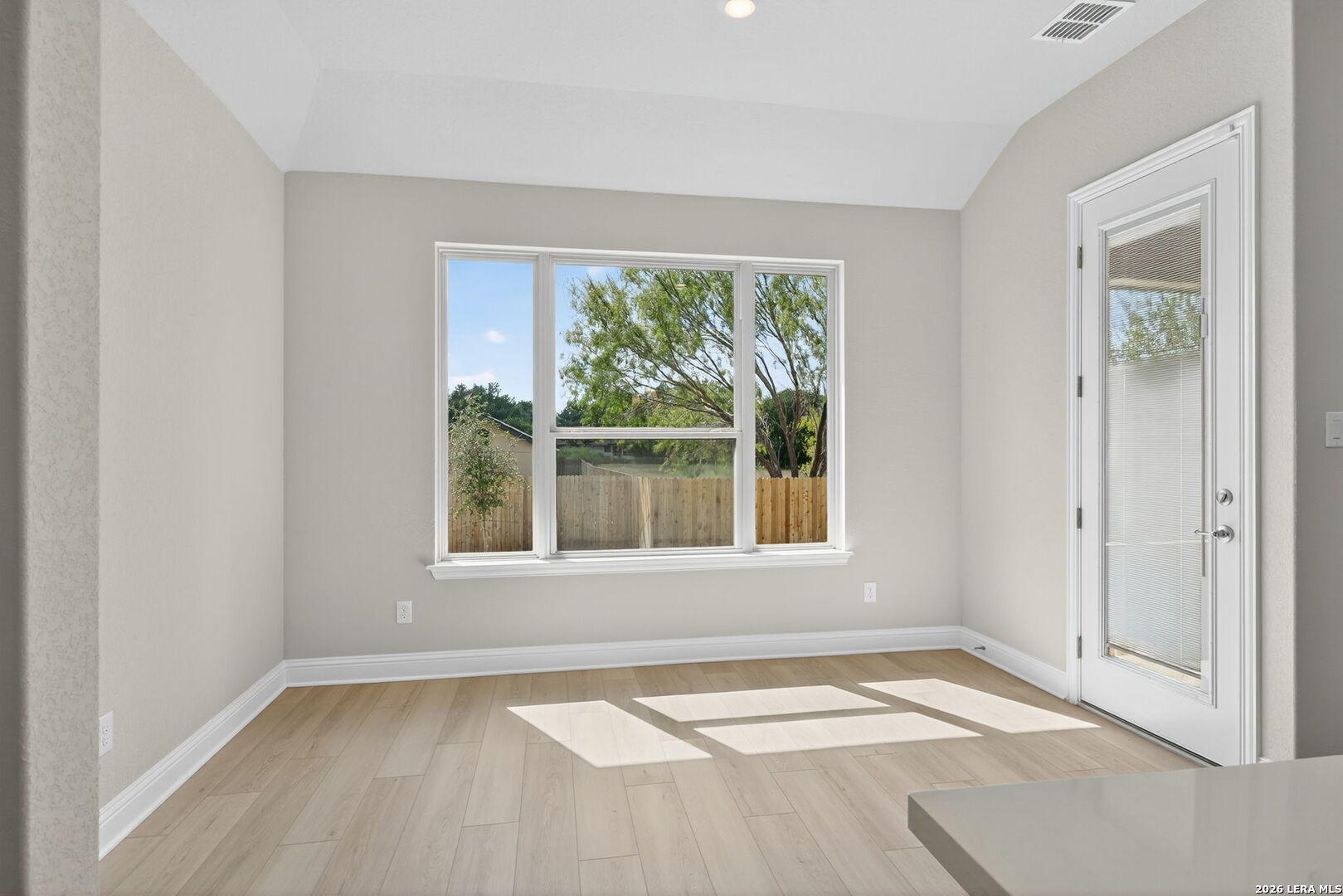 254 Allen Avenue Castroville, TX 78009 - Photo 11 of 24 an empty room with a window