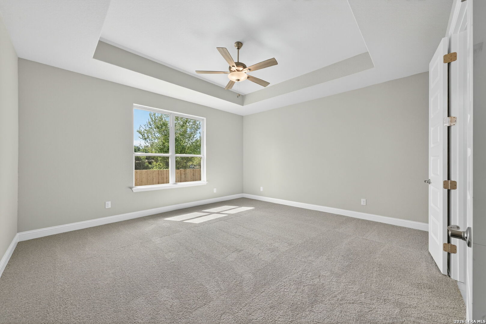 254 Allen Avenue Castroville, TX 78009 - Photo 13 of 24 a view of an empty room with a window