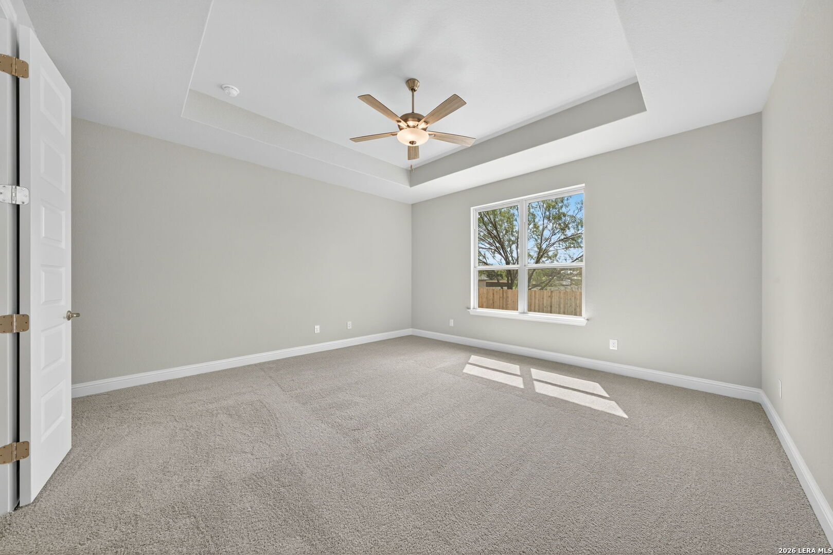 254 Allen Avenue Castroville, TX 78009 - Photo 14 of 24 a view of an empty room with a window