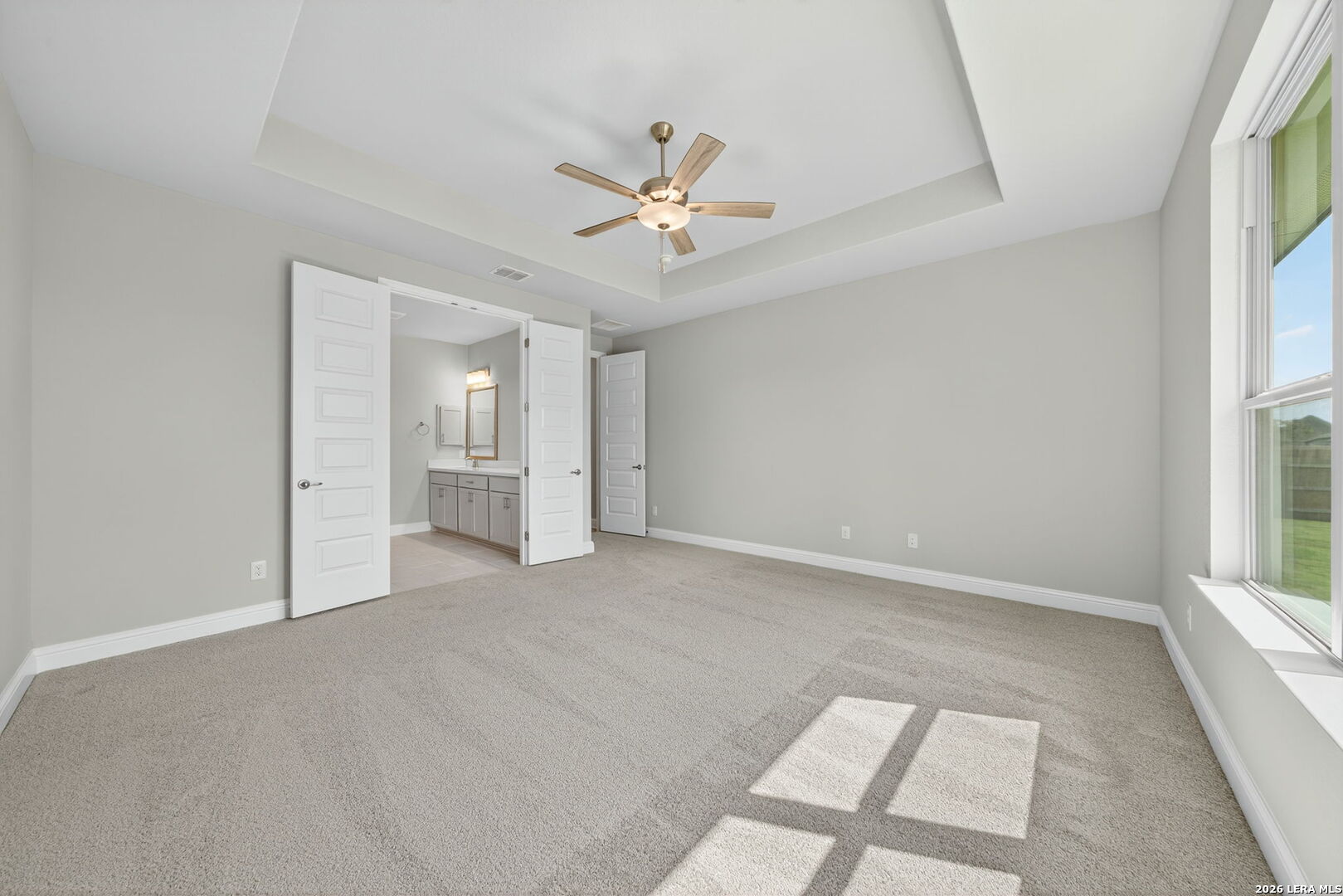 254 Allen Avenue Castroville, TX 78009 - Photo 15 of 24 wooden floor in an empty room with a window