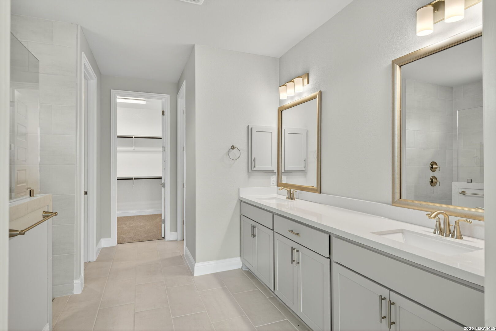 254 Allen Avenue Castroville, TX 78009 - Photo 17 of 24 a spacious bathroom with a double vanity sink mirror and