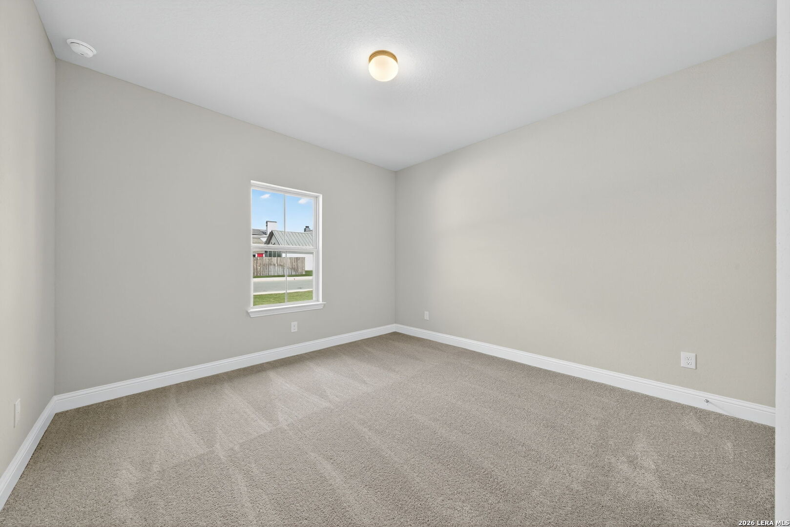 254 Allen Avenue Castroville, TX 78009 - Photo 22 of 24 an empty room with windows