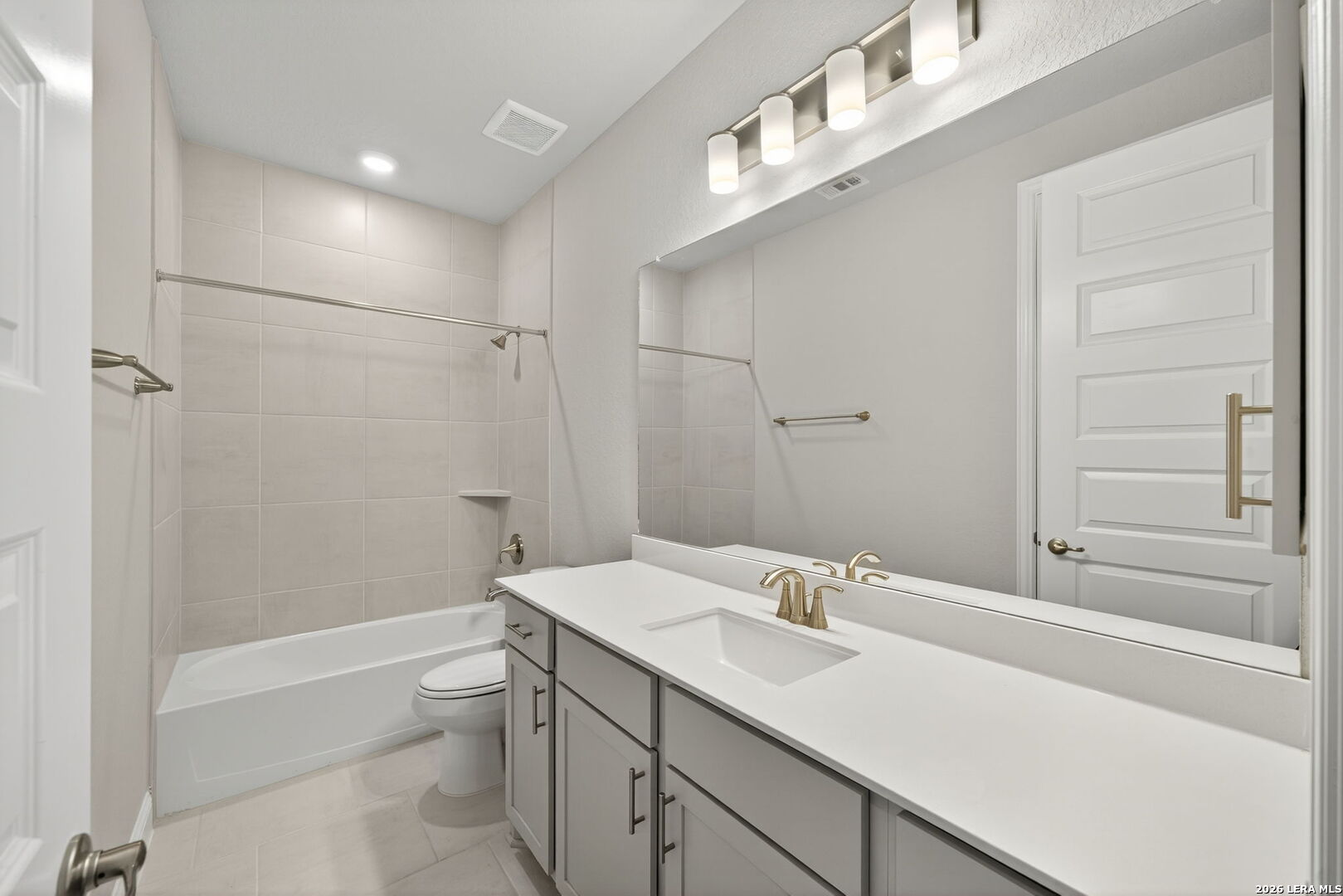 254 Allen Avenue Castroville, TX 78009 - Photo 23 of 24 a bathroom with a sink a toilet and shower