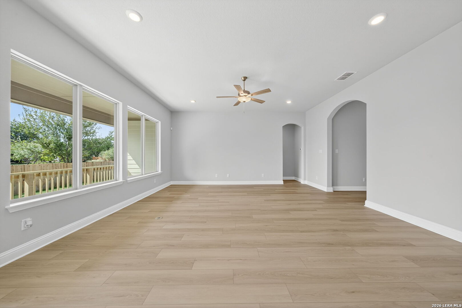 254 Allen Avenue Castroville, TX 78009 - Photo 3 of 24 a view of an empty room with a window