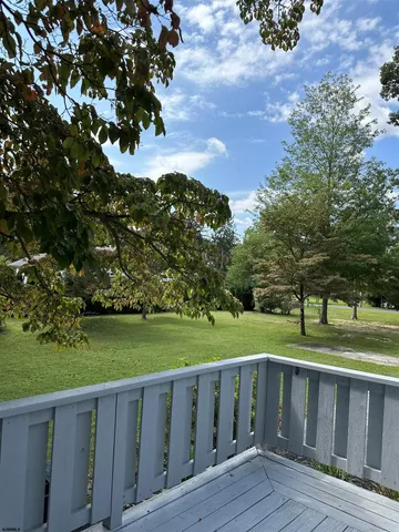 a view of an outdoor space and a yard