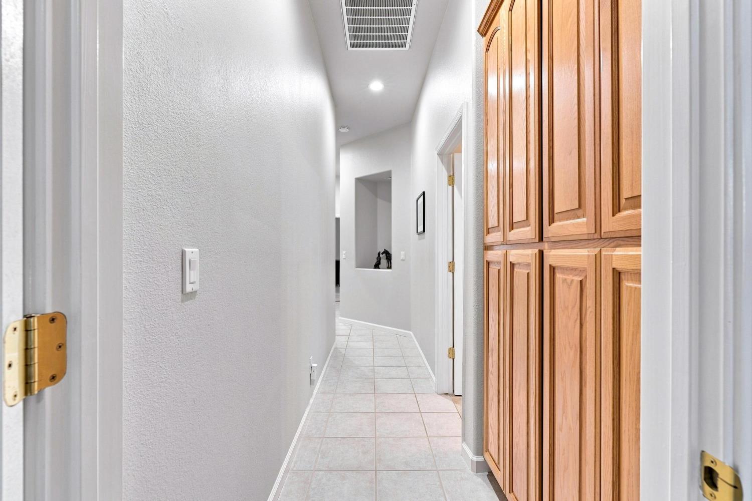 217 Rock Ridge Lane Copperopolis, CA 95228 - Photo 41 of 55 Hallway - Lots of additional storage.