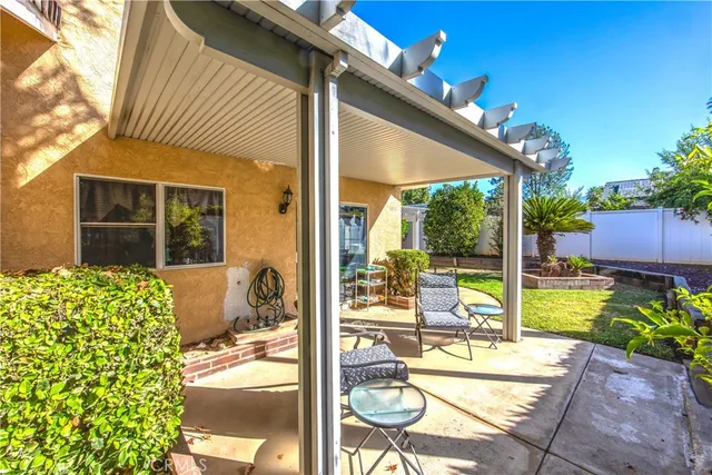 a house with swimming pool in front of it
