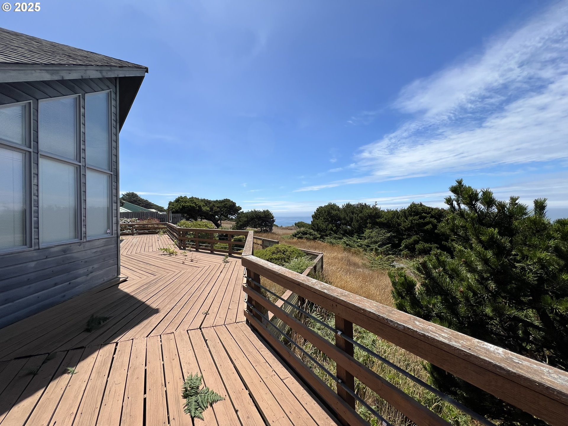 33636 Ophir Road Gold Beach, OR 97444 - Photo 11 of 22 a view of balcony with furniture