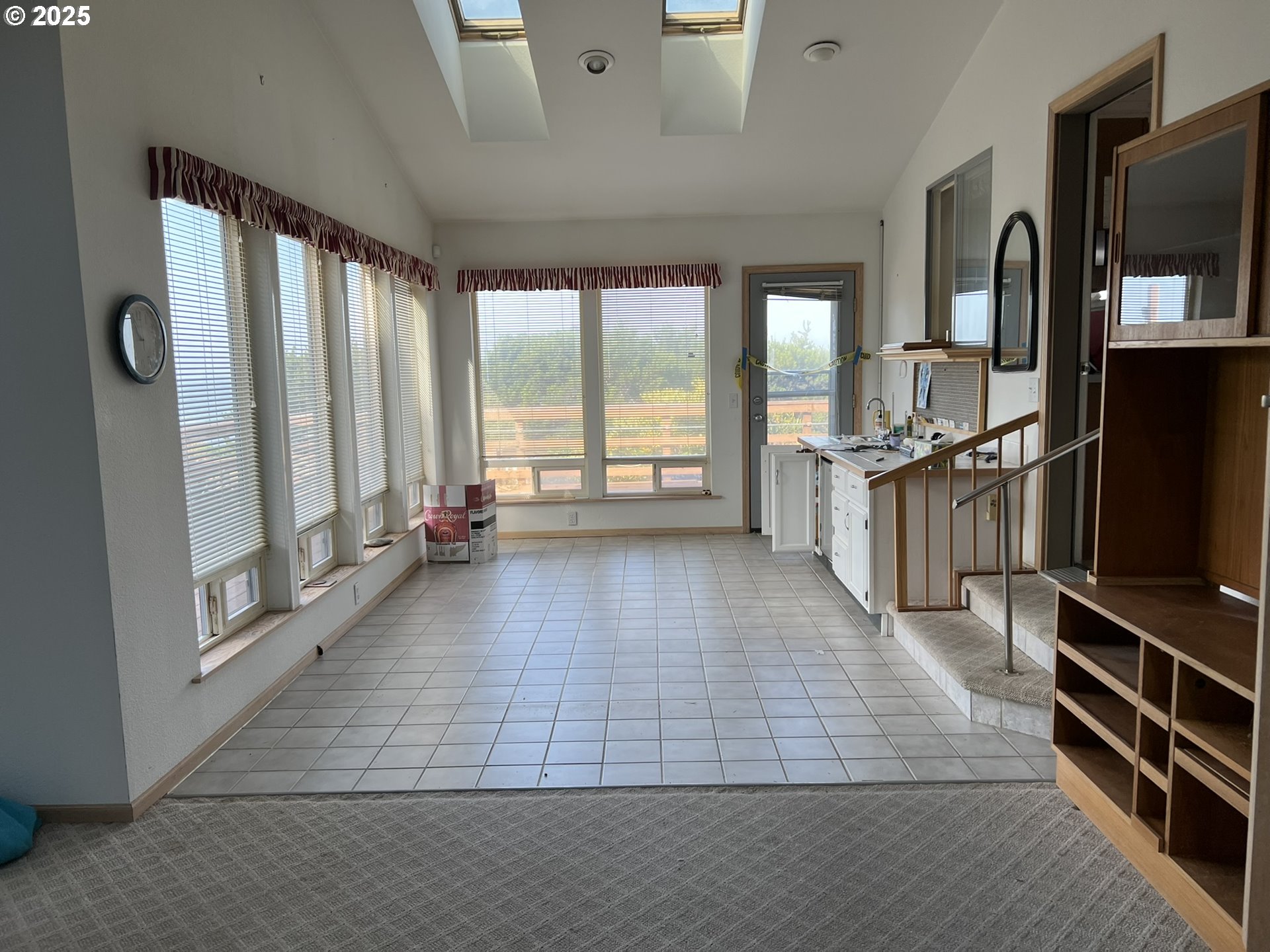 33636 Ophir Road Gold Beach, OR 97444 - Photo 12 of 22 a view of a living room and a flat screen tv
