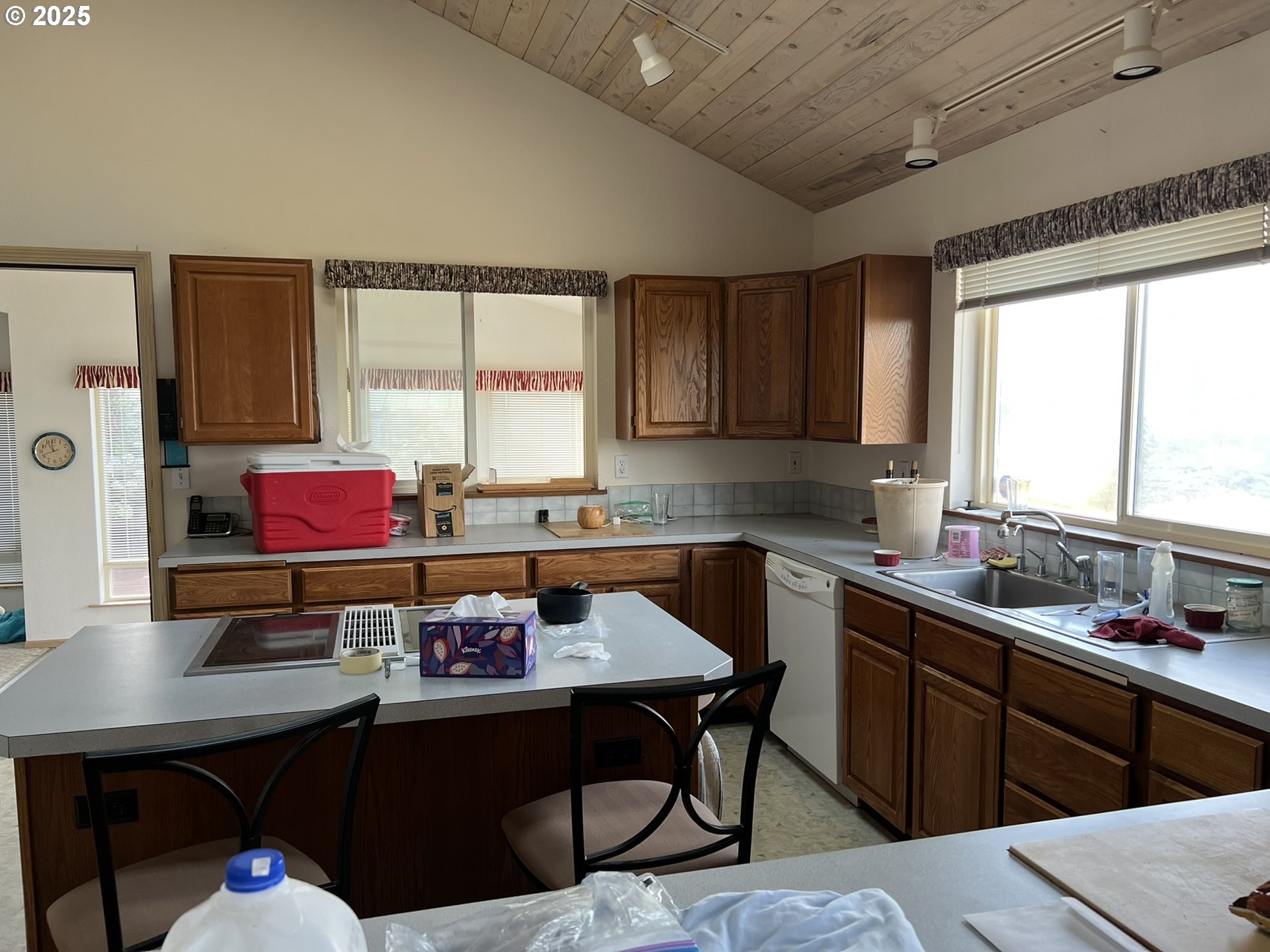 33636 Ophir Road Gold Beach, OR 97444 - Photo 14 of 22 a kitchen with a sink cabinets and window