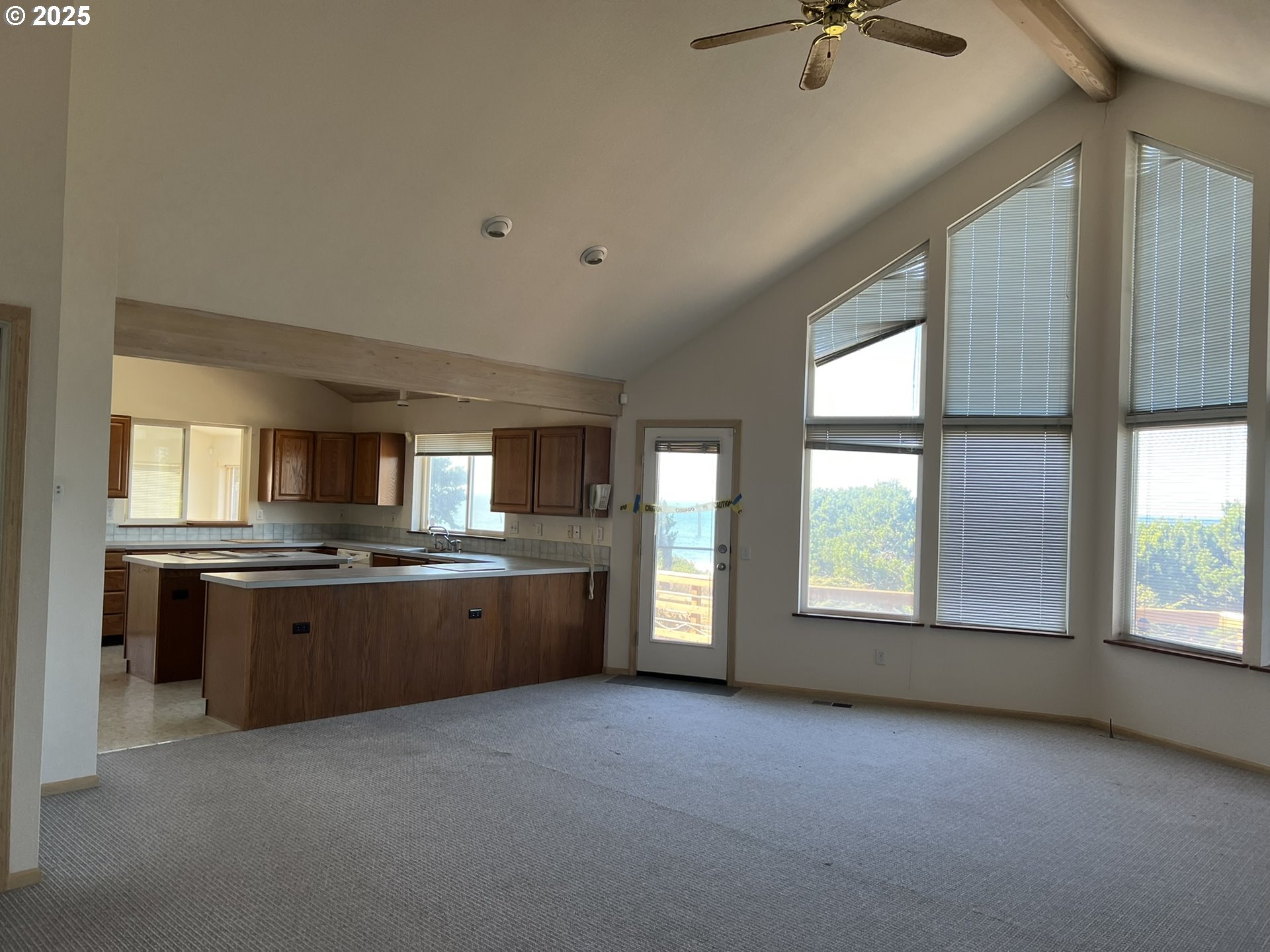 33636 Ophir Road Gold Beach, OR 97444 - Photo 16 of 22 a large kitchen with stainless steel appliances granite countertop a stove and a sink