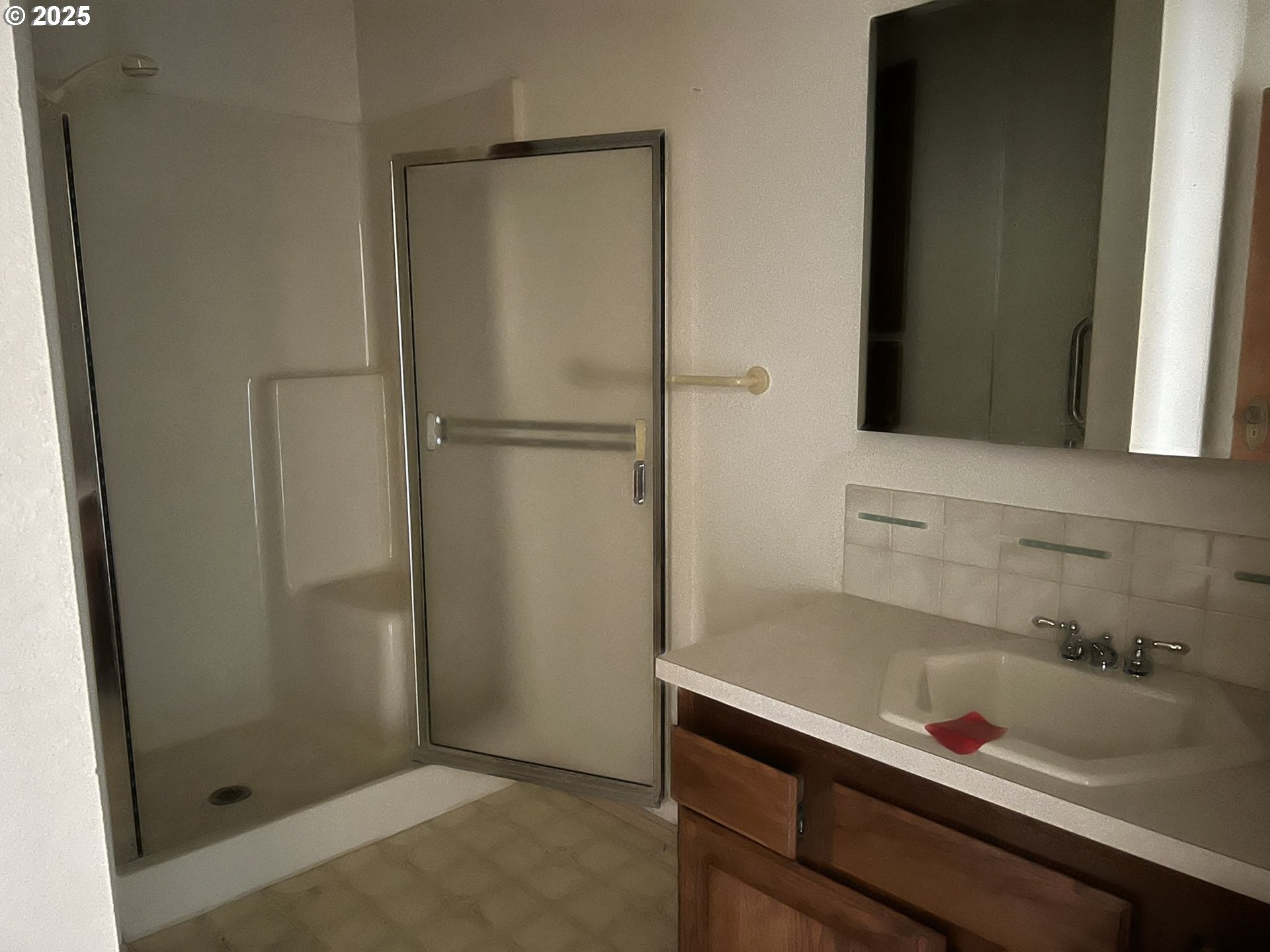 33636 Ophir Road Gold Beach, OR 97444 - Photo 18 of 22 a bathroom with a shower and a sink