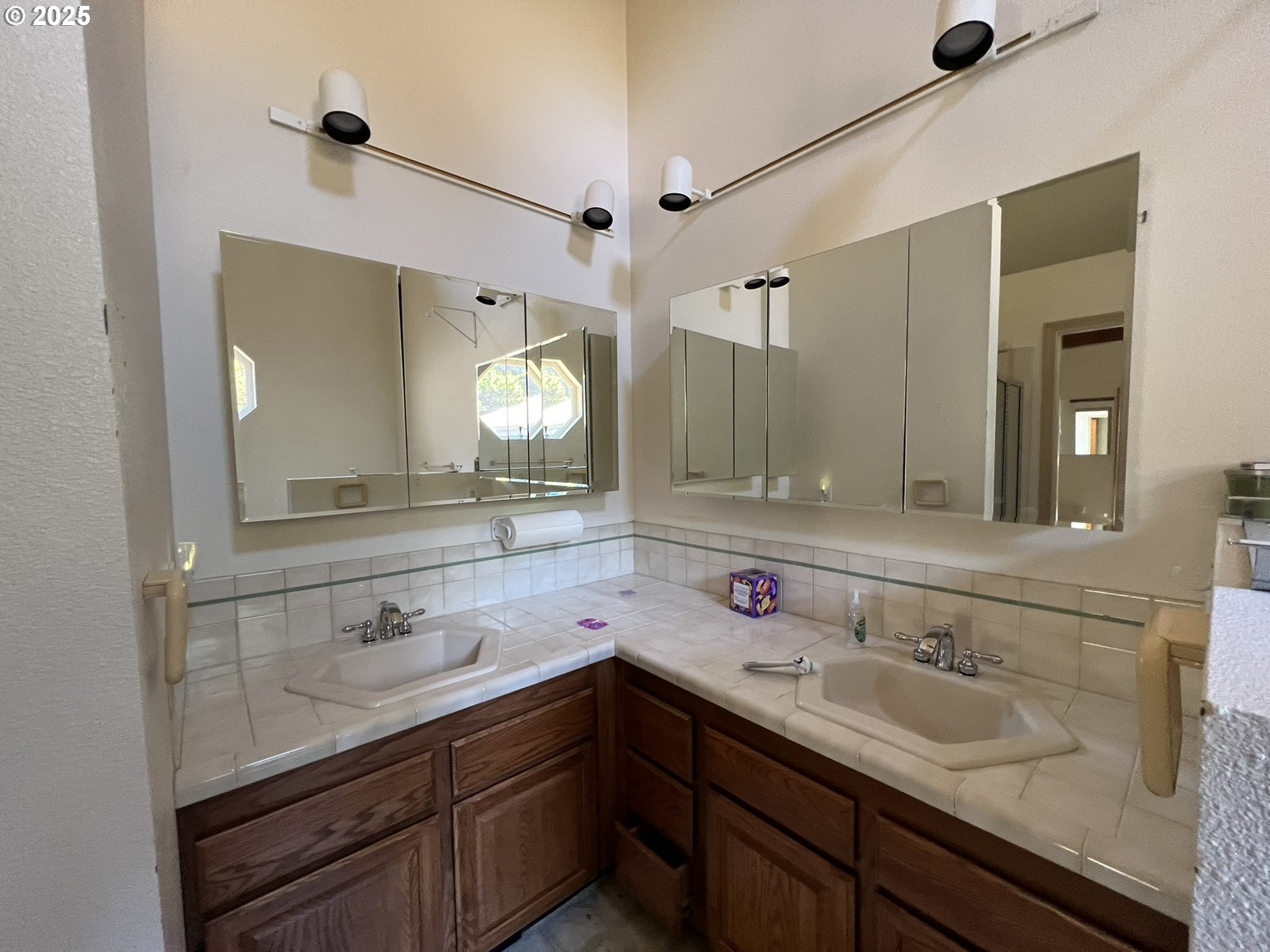 33636 Ophir Road Gold Beach, OR 97444 - Photo 5 of 22 a bathroom with a sink and a mirror