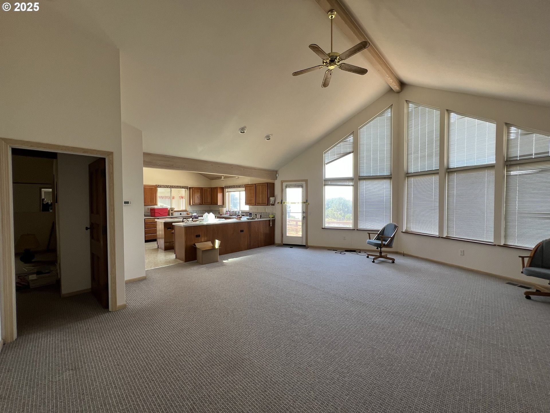 33636 Ophir Road Gold Beach, OR 97444 - Photo 7 of 22 a view of a livingroom with furniture and a large window