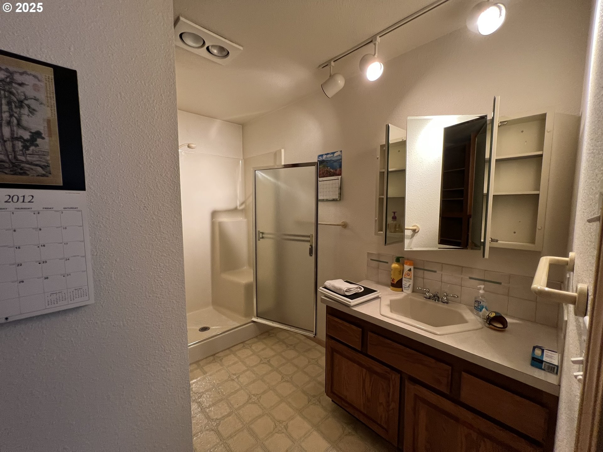 33636 Ophir Road Gold Beach, OR 97444 - Photo 8 of 22 a bathroom with a double vanity sink mirror and double
