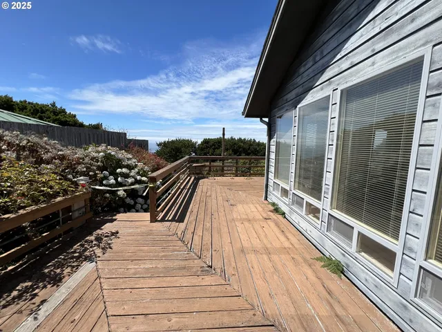 a view of balcony with furniture