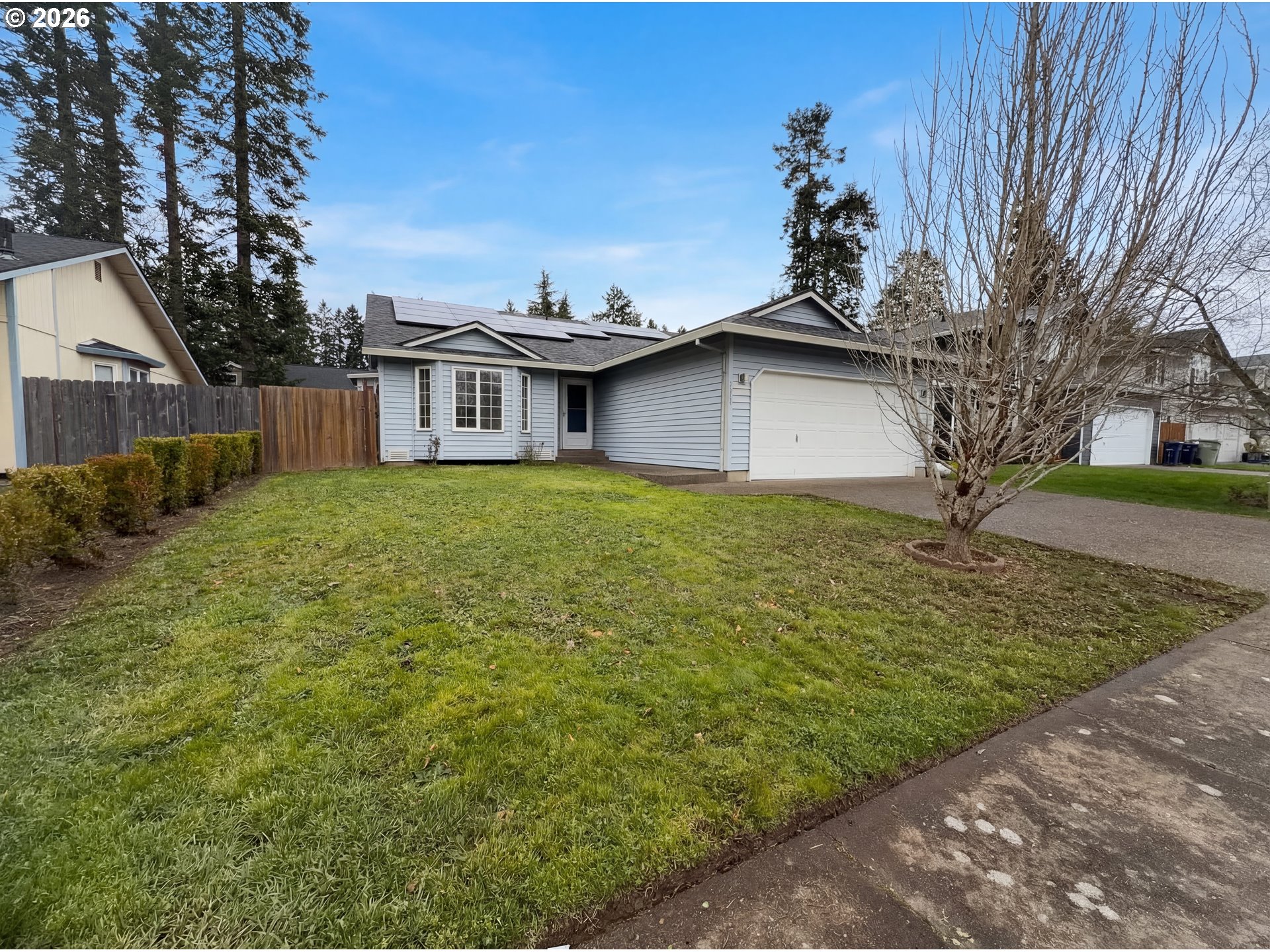 8641 Northeast Windstone Street Beaverton, OR 97006 - Photo 17 of 18 a house view with a garden space