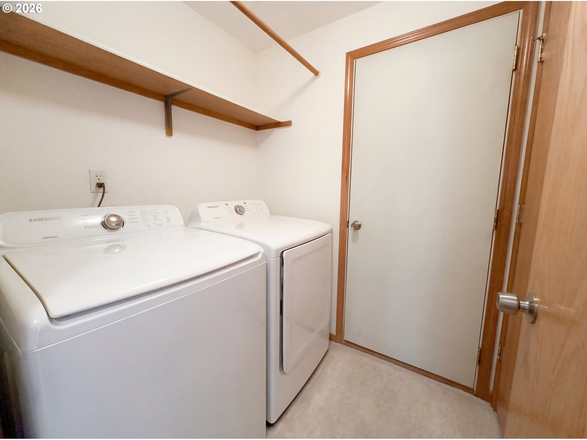 8641 Northeast Windstone Street Beaverton, OR 97006 - Photo 6 of 18 a utility room with dryer and washer