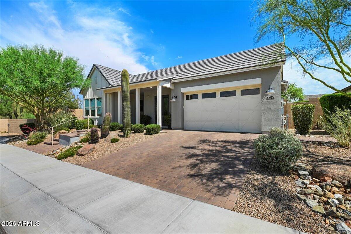 4412 East Roy Rogers Road Cave Creek, AZ 85331 - Photo 5 of 40 a view of a house with backyard and sitting area