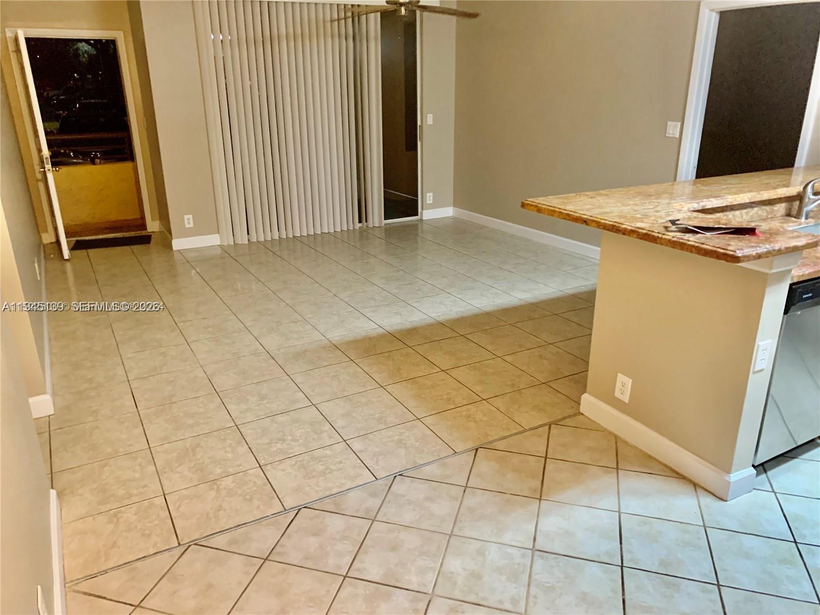 621 Lyons Road, Unit 9101 Coconut Creek, FL 33063 - Photo 8 of 30 Entry - living area