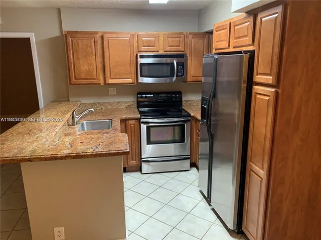 $2,100 | 621 Lyons Road, Unit 9101, Coconut Creek, FL 33063