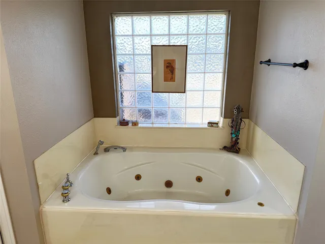 a bathroom with a bathtub
