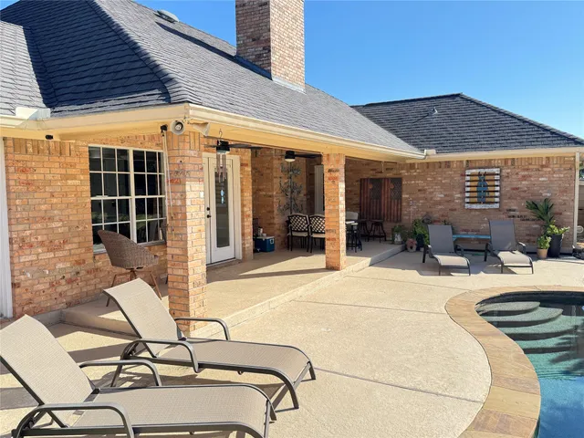 a building exterior with furniture