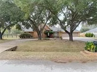 a view of yard with trees