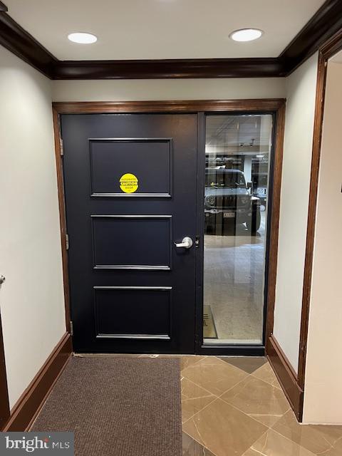 1451 Belmont Street Northwest, Unit P47 Washington, DC 20009 - Photo 6 of 8 a view of a hallway with wooden floor and furniture