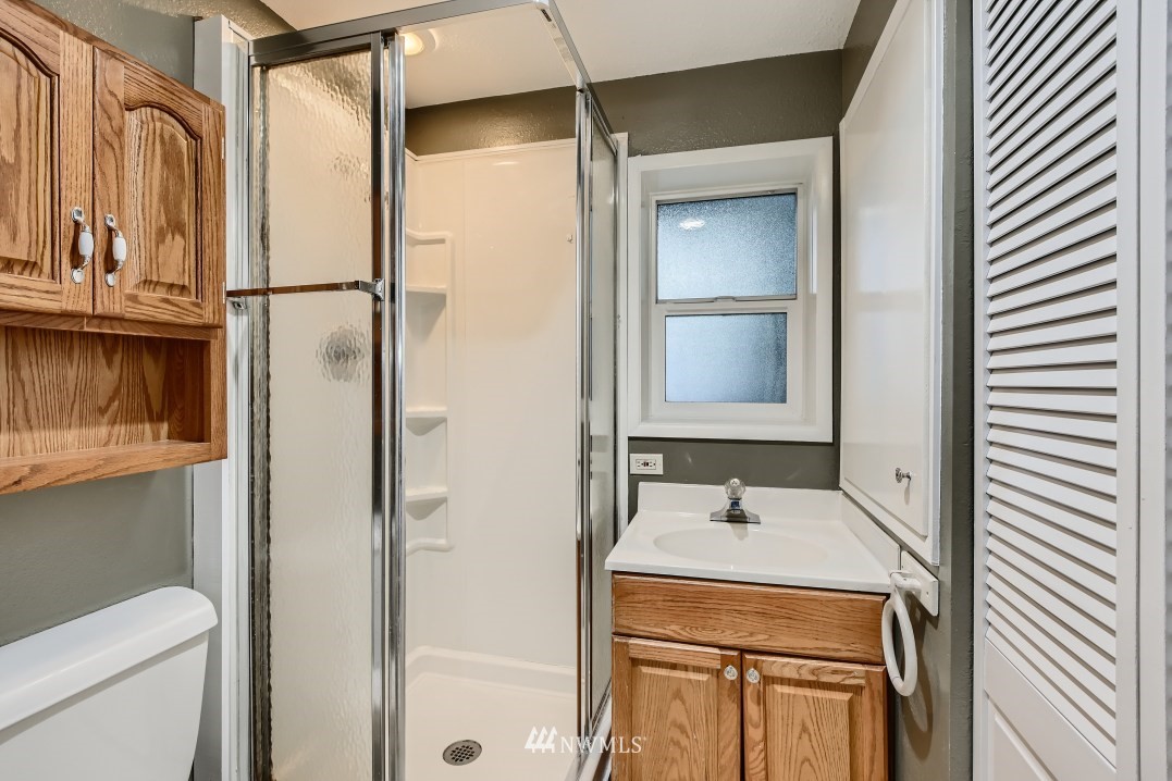 7577 Old Redmond Road, Unit 7 Redmond, WA 98052 - Photo 12 of 21 a bathroom with a sink toilet and shower