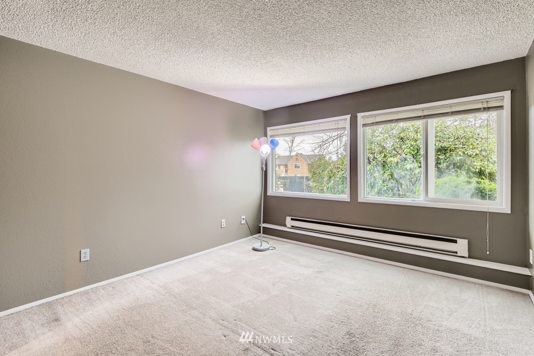 7577 Old Redmond Road, Unit 7 Redmond, WA 98052 - Photo 9 of 21 a view of an empty room with a window