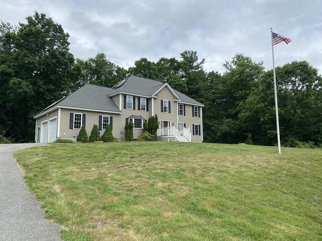 78 Center Road Shirley, MA 01464 - Photo 1 of 6 a house with a big yard and large trees
