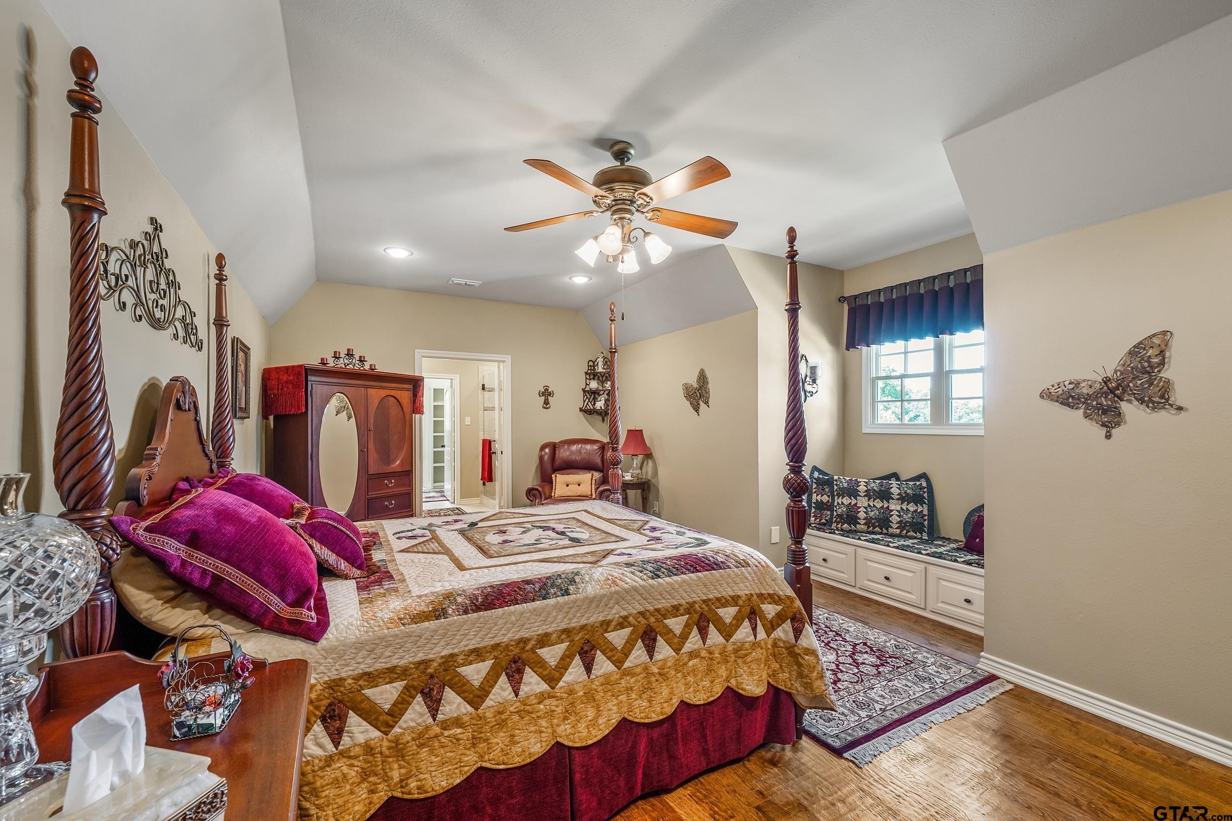 535 Riata Road Bullard, TX 75757 - Photo 24 of 47 a bedroom with a bed and dresser