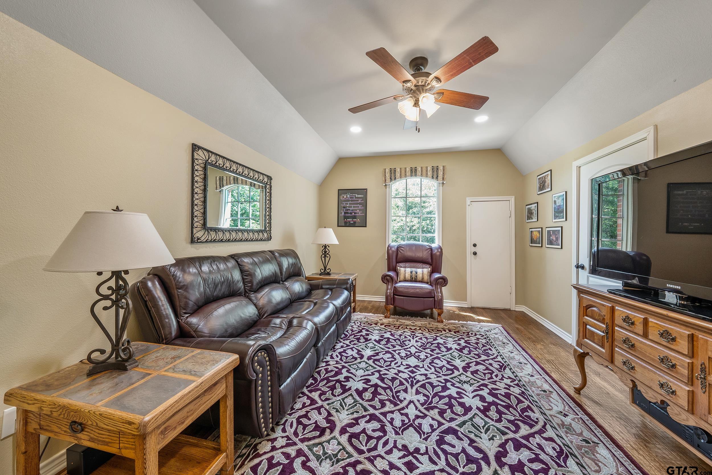 535 Riata Road Bullard, TX 75757 - Photo 26 of 47 a living room with furniture and a flat screen tv