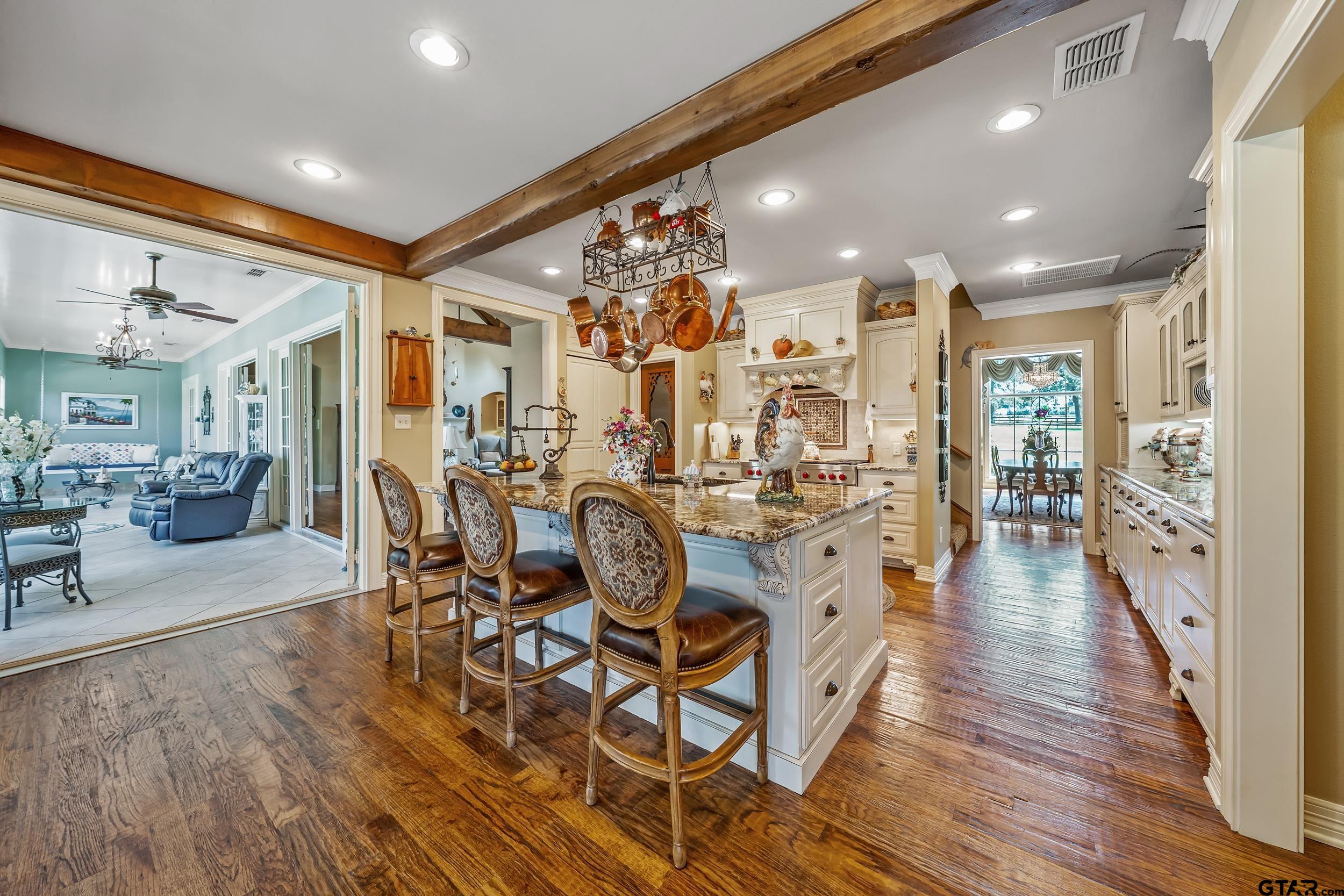 535 Riata Road Bullard, TX 75757 - Photo 10 of 47 a view of a dining room with furniture and wooden floor