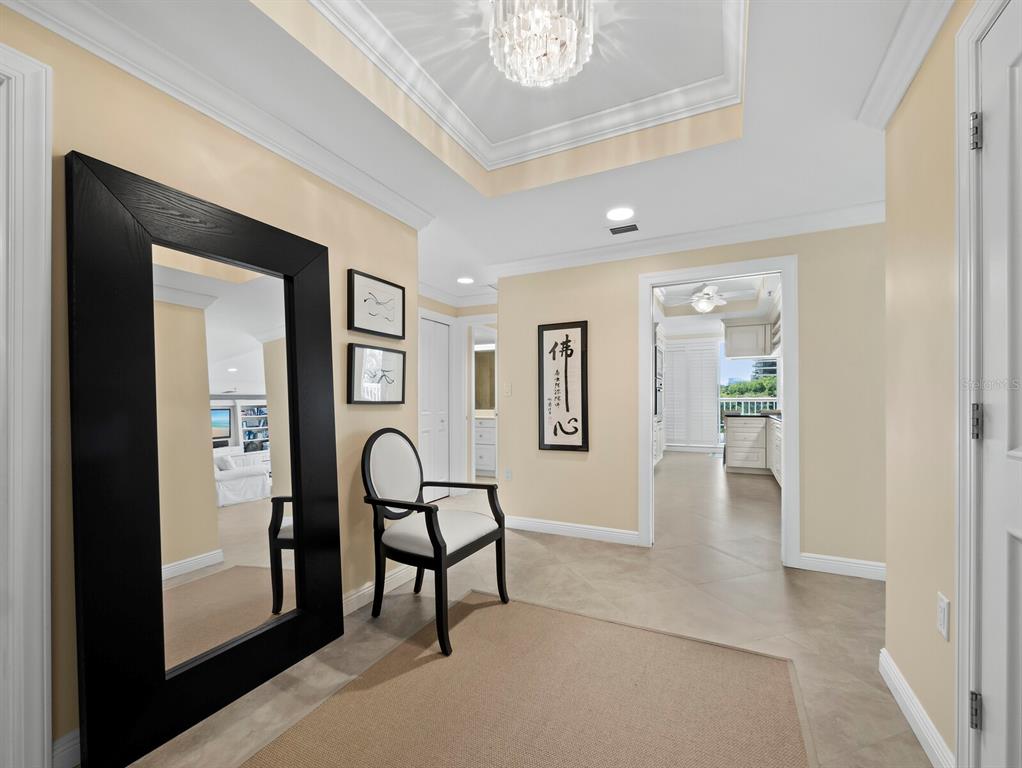 455 Longboat Club Road, Unit 402 Longboat Key, FL 34228 - Photo 26 of 48 a view of a livingroom with furniture and front door