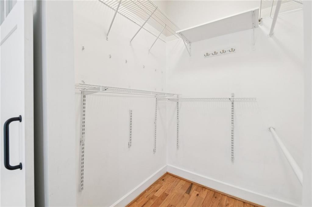 384 Ralph McGill Boulevard Northeast, Unit 105 Atlanta, GA 30312 - Photo 15 of 29 a view of a room with racks on the wall