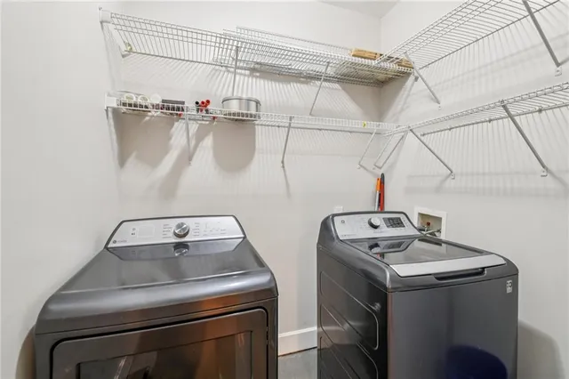a utility room with dryer and washer