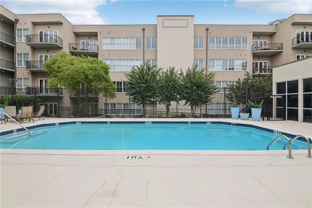 a view of a studio with wooden floor