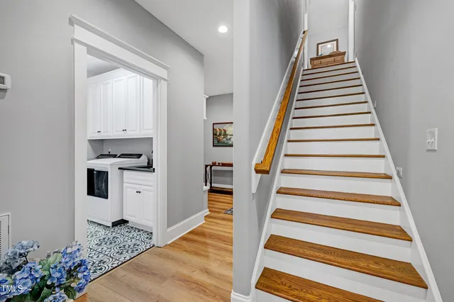 a huge green field with lots of trees