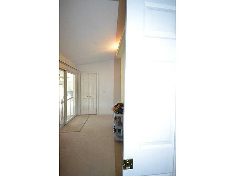 39 Brayton Road Tiverton, RI 02878 - Photo 12 of 24 Master Bedroom. Pocket door to MBR, Spa room & mud room entry