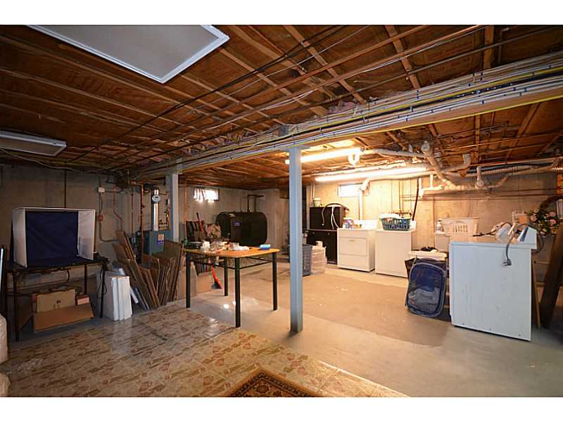 39 Brayton Road Tiverton, RI 02878 - Photo 21 of 24 Cellar or Basement. Laundry,sink. waterproofed basement. 200 am breakers. Talking alarm. Bulkhead & access to kitchen above.
