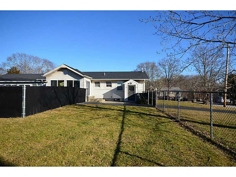 39 Brayton Road Tiverton, RI 02878 - Photo 22 of 24 Exterior Back. Fenced area Plus a fenced entire back yard