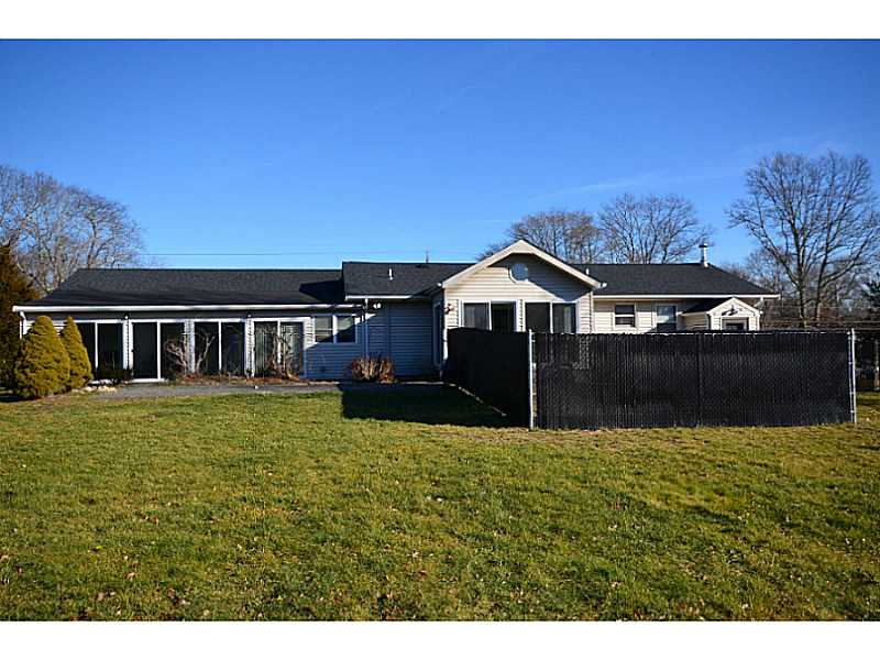 39 Brayton Road Tiverton, RI 02878 - Photo 23 of 24 Exterior Back. View to Great Room/