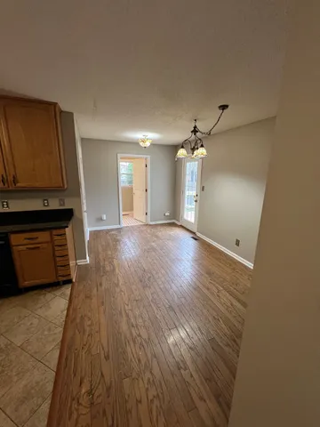 a view of deck with mountain and wooden floor