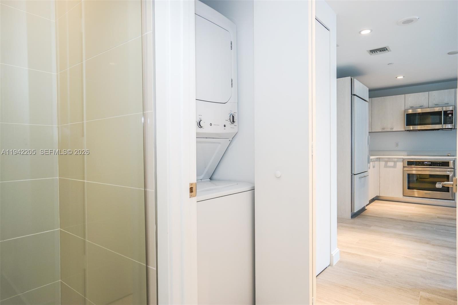 55 Southwest 9th Street, Unit 1407 Miami, FL 33130 - Photo 7 of 24 a view of a kitchen and electric equipment