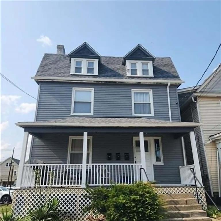 340 Virginia Avenue, Unit 3 Butler, PA 16001 - Photo 1 of 12 a front view of a house with a yard
