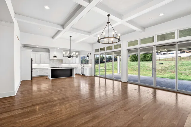 a bathroom with a sink a mirror and a light fixture