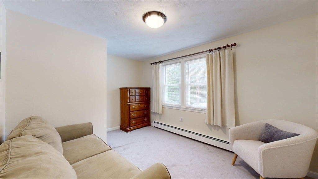 990 Forest Street North Andover, MA 01845 - Photo 34 of 42 a living room with furniture and a window