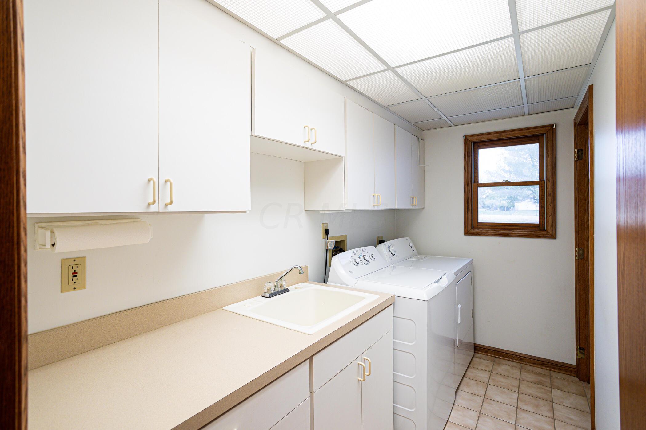 8091 Dustin Road Galena, OH 43021 - Photo 42 of 72 1st Floor Laundry!